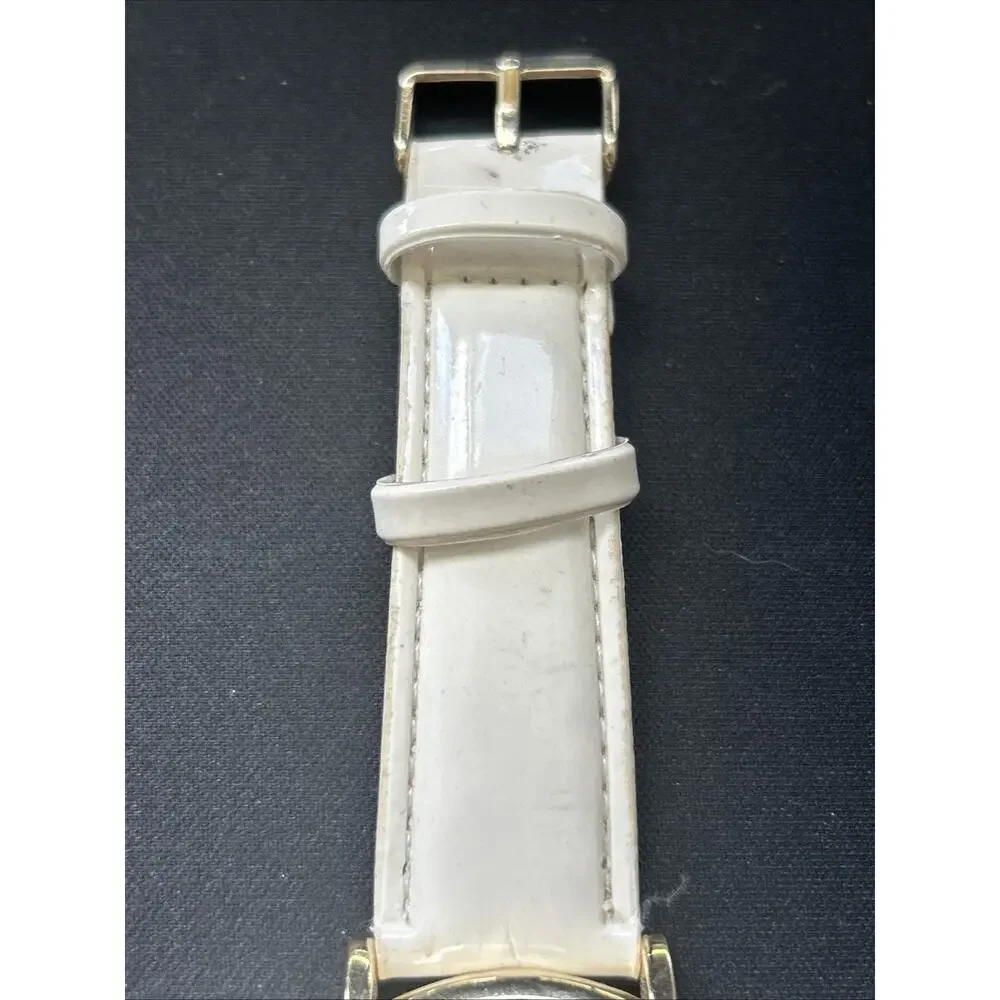 Gold Tone White Band Striped Dial Women’s Quartz Watch